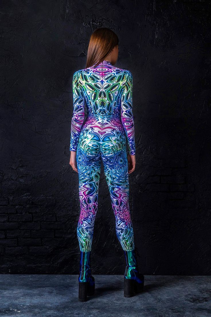 The Liquid Insect Costume is the perfect combination of trippy, sexy and comfy.  This piece is made from a high quality stretchy and breathable Lycra fabric, that feels wonderful on the skin. It’s printed with outstanding graphics that react to UV light, so you can literally glow.  The design features a body con fit with long sleeves, a mock neckline and a sturdy zipper neatly hidden in the back. Features: Mock Neckline Robust & Hidden Back Zipper Closure Long Sleeves UV Black Light Reactive 82% Stretch Multicolor Unitard, Insect Costume, Uv Black Light, Lycra Fabric, Mock Neckline, Uv Light, Black Light, Design Features, Insects