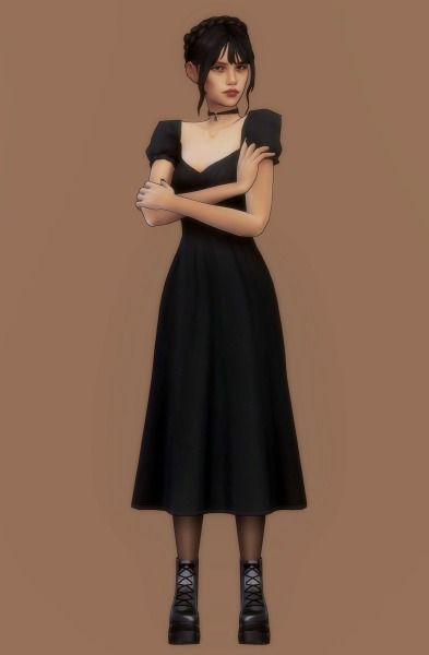 a woman in a black dress with her arms crossed