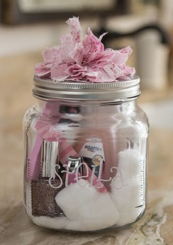 a mason jar filled with baby's breath flowers and personalized items is featured in this postcard