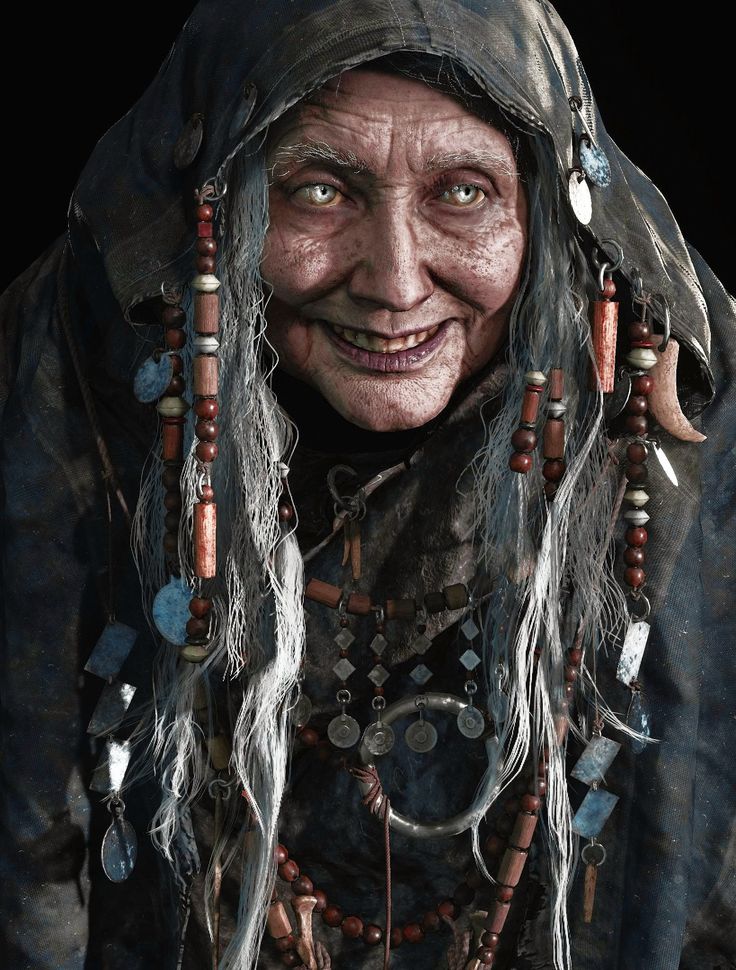 an old woman with long hair and wearing jewelry