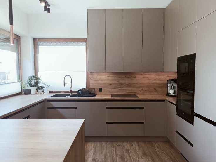 the kitchen is clean and ready for us to use in its new owner's home