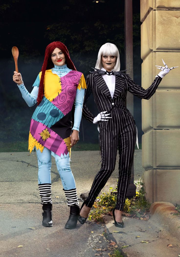 two people in costumes standing next to each other