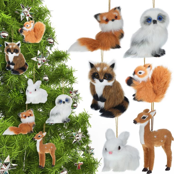 an ornament is hanging from a christmas tree with many different types of animals on it