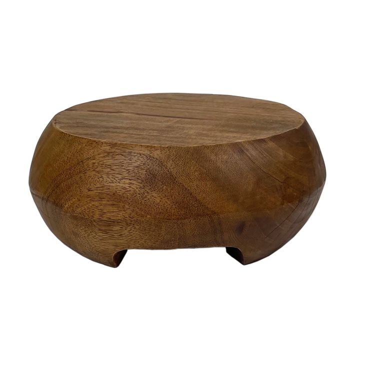 the wooden stool is made out of wood