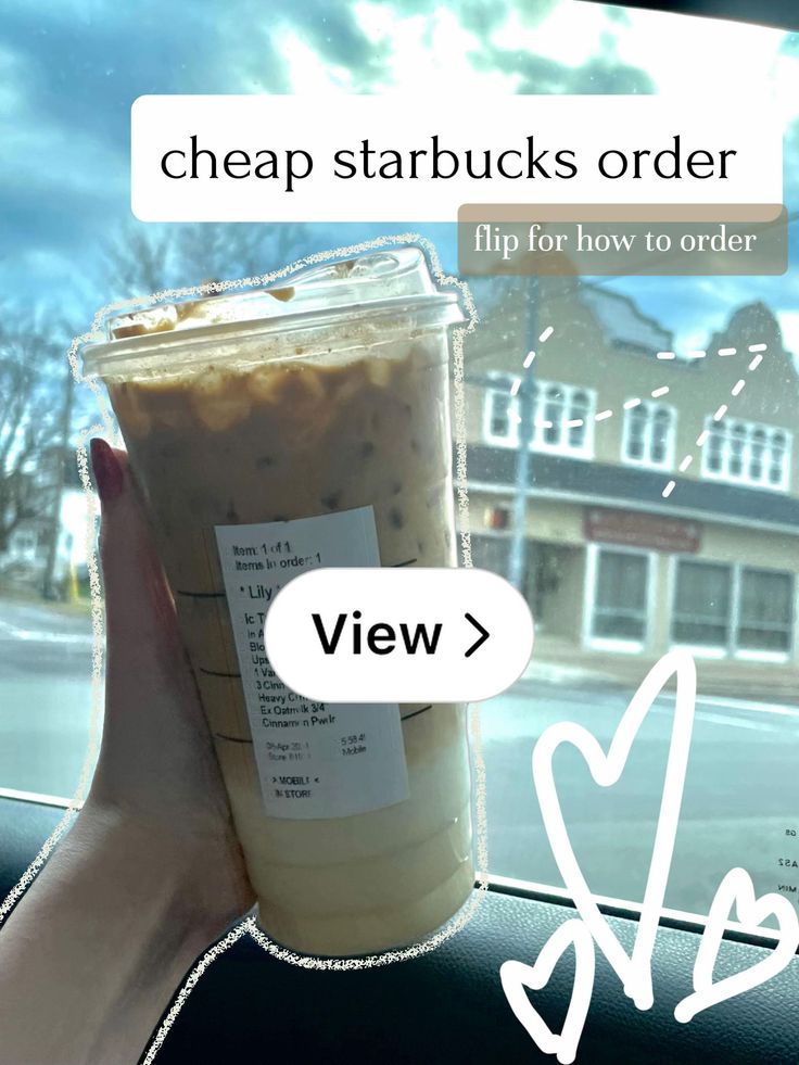 a person holding up a drink in front of a window that says cheap starbuckss order flip for how to order