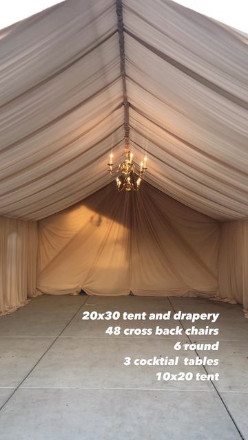 a large white tent with chandelier hanging from it's ceiling and the words, 20x30 tent and drapery 48 cross back chairs