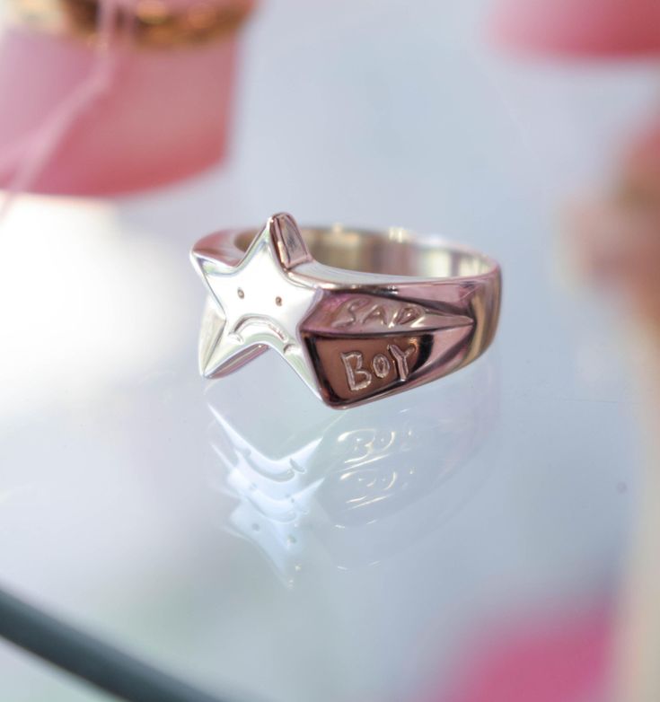 The cutest little star ring with a sad buy made from solid sterling silver or plated brass. His frowned face reminds you that some time it is ok to be a little sad.  Each sad boy is carved by hand, so there might be slight difference between the ring you receive and the one pictured.  *Details The ring is approximately 1.5cm (0.8in) wide You can choose between brass and sterling silver Silver or gold plated ♥ Every piece is carefully handcrafted in my studio in Thessaloniki ♥ ** The ring picture Funky Rings Silver, Frowned Face, Sterling Silver Star-shaped Signet Ring For Gift, Star-shaped Stamped 925 Silver Ring As Gift, Star-shaped 925 Sterling Silver Rings For Gifts, Gold Star Ring, Silver Sterling Silver Engraved Ring For Birthday, Birthday Engraved Silver Sterling Ring, Cute Silver Rings For Birthday