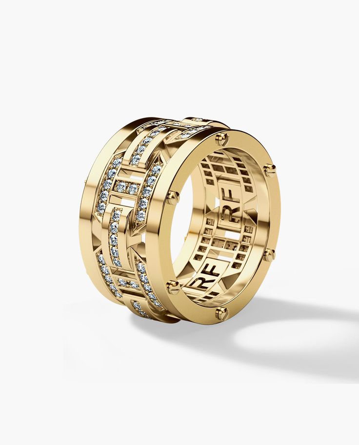 a gold ring with roman numerals and diamonds on the inside, set in 18k yellow gold