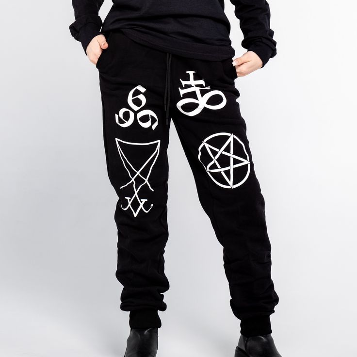 Unisex "Jogger" Style Sweatpants from Forbidden Alchemy. Designed for both comfort and style, these slim-fitting joggers feature a tapered ankle for a sleek silhouette that flatters all body types. Crafted from a premium blend of 80% cotton and 20% polyester, they offer the perfect balance of softness and durability, ensuring all-day comfort and long-lasting wear. Slim Fit: Tailored to hug your body while allowing ease of movement. Tapered Ankle: Provides a modern, streamlined look. Premium Fabr Winter Tapered Leg Joggers For Streetwear, Hip Hop Cotton Bottoms For Jogging, Hip Hop Style Stretch Bottoms For Jogging, Streetwear Bottoms With Comfort Waistband, Relaxed Fit Hip Hop Pants For Jogging, Winter Streetwear Pants With Comfort Waistband, Fitted Streetwear Pants With Elastic Waistband, Fitted Cotton Joggers For Streetwear, Hip Hop Stretch Bottoms For Jogging