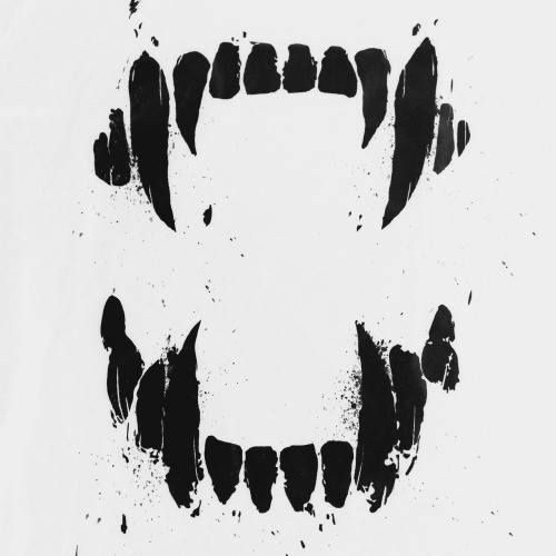 black and white photograph of an animal's teeth with paint splattered on it