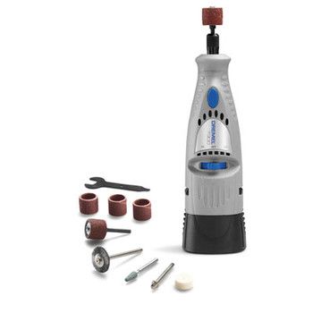 an electric toothbrush holder is shown with tools and other items to use on it