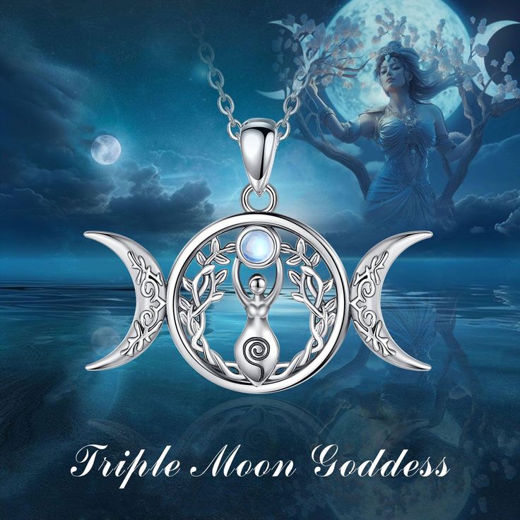 the moon goddess pendant is shown on a blue background