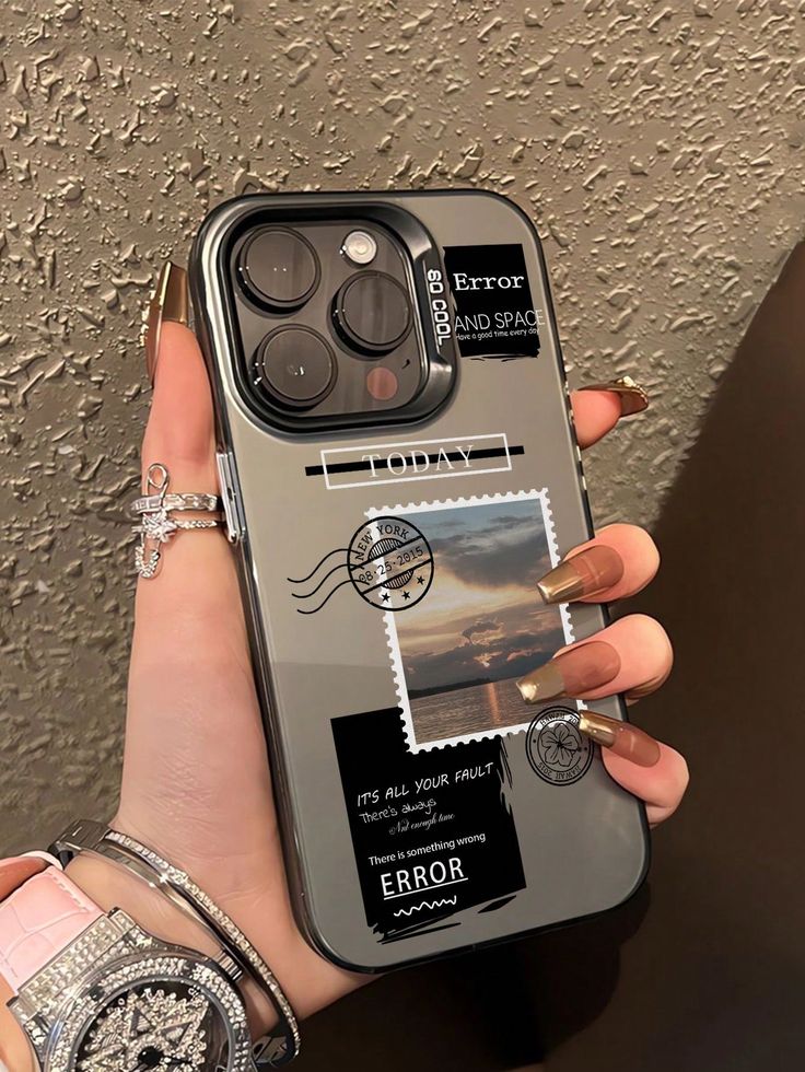 a woman is holding up her phone case with stamps on it and an airmail stamp