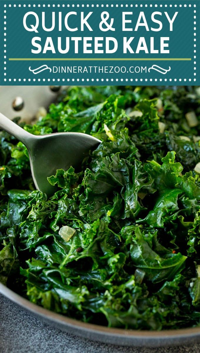 a bowl filled with kale and topped with a spoon