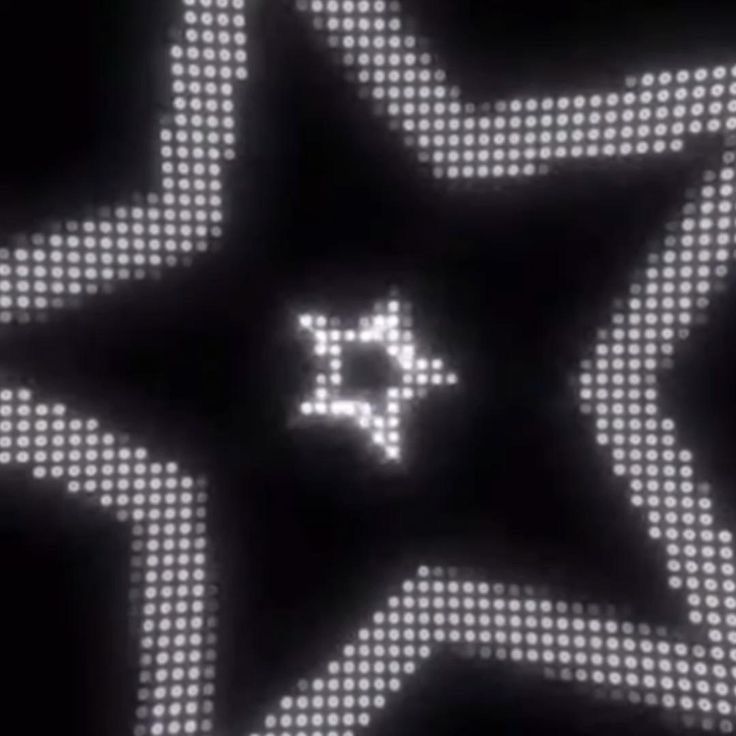 an abstract image of a star in the middle of a black and white background with dots