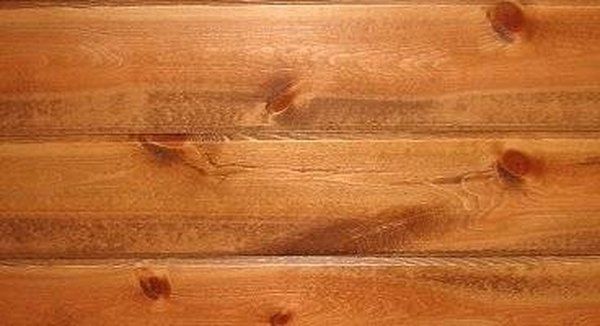 closeup of the wood grains on an old wooden flooring paneled wall