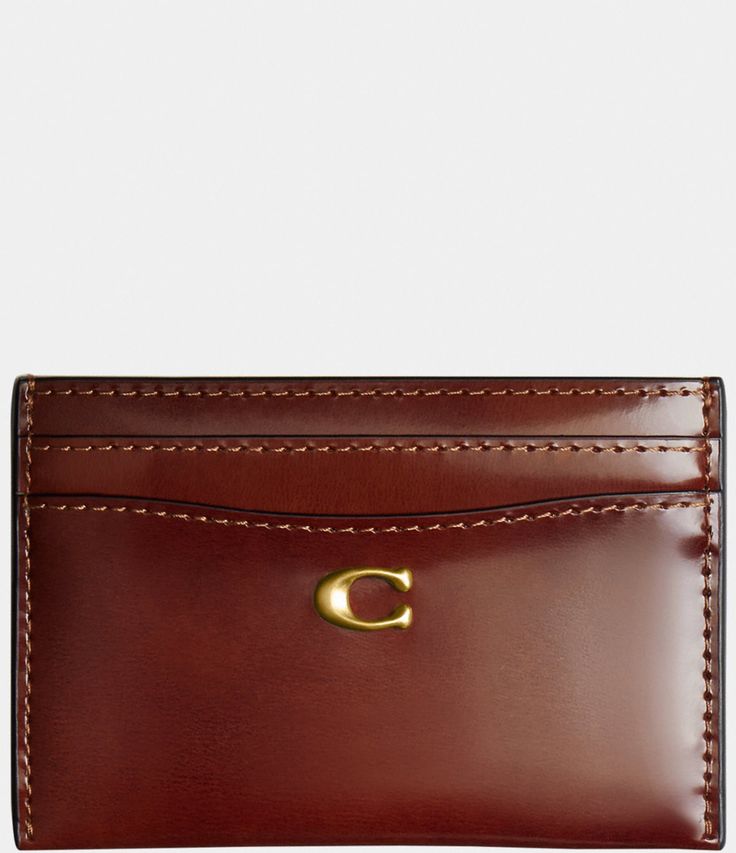 From COACH&#x2C; the Spazzolato Leather Essential Card Case features: Spazzolato leatherFive credit card slotsApprox.: 4.25" (L) x 3" (H)Imported. Classic Brown Coach Card Holder, Elegant Brown Card Holder With Slots, Classic Coach Leather Wallets, Designer Brown Card Holder For Formal Use, Designer Brown Card Holder For Formal Occasions, Elegant Brown Business Card Holder, Classic Coach Rectangular Card Holder, Classic Card Holder With Leather Lining For Formal Use, Elegant Coach Leather Card Holder