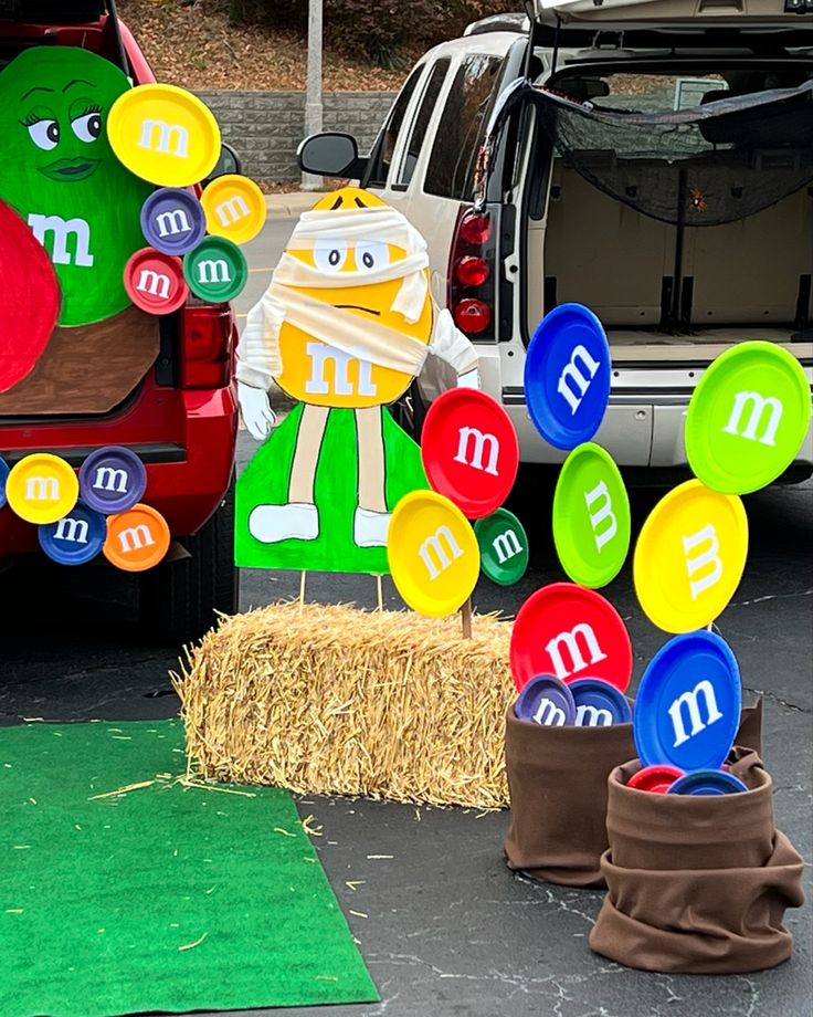 an assortment of items are displayed in the back of a truck, including balloons and magnets