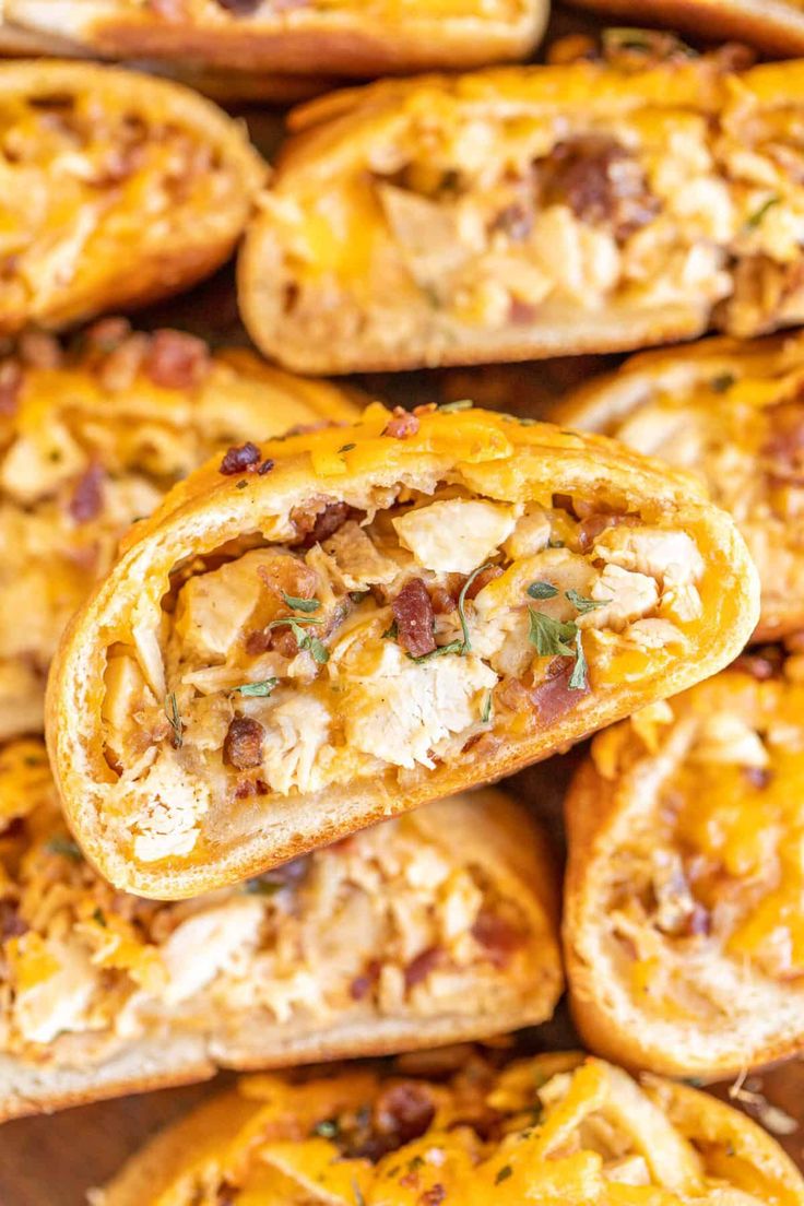 chicken and cheese puff pastry rolls on a cutting board