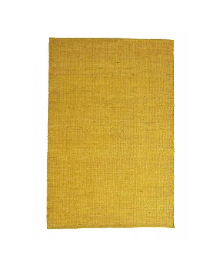 a yellow rug on a white background