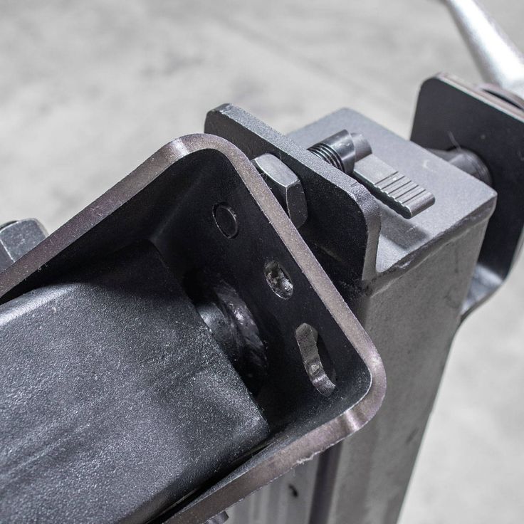 a close up view of a parking meter with the door open and nozzles