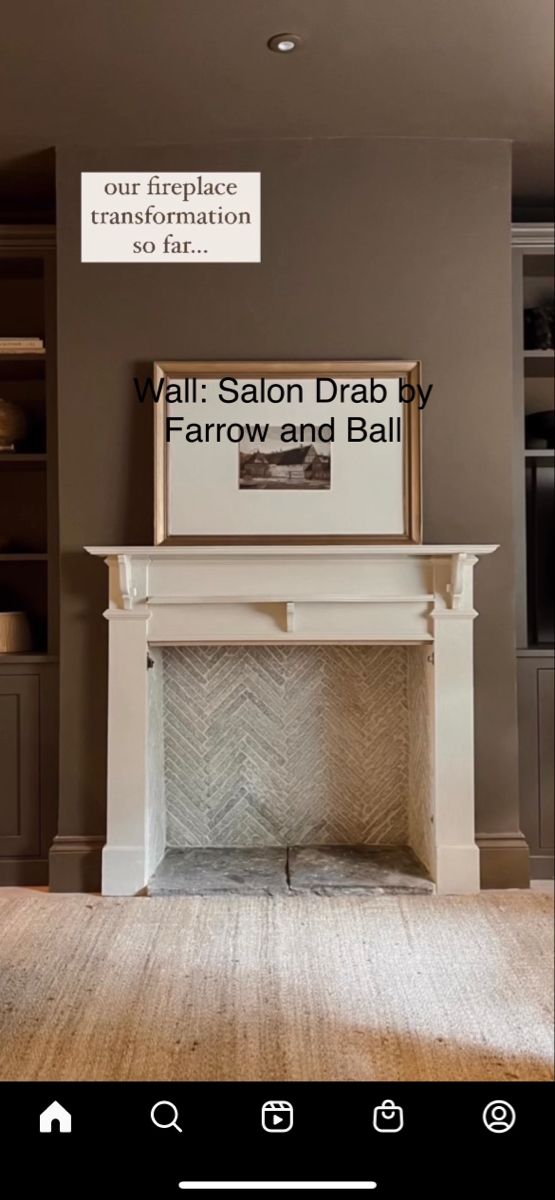 a fireplace with a sign above it that says wall salon draby farrow and ball