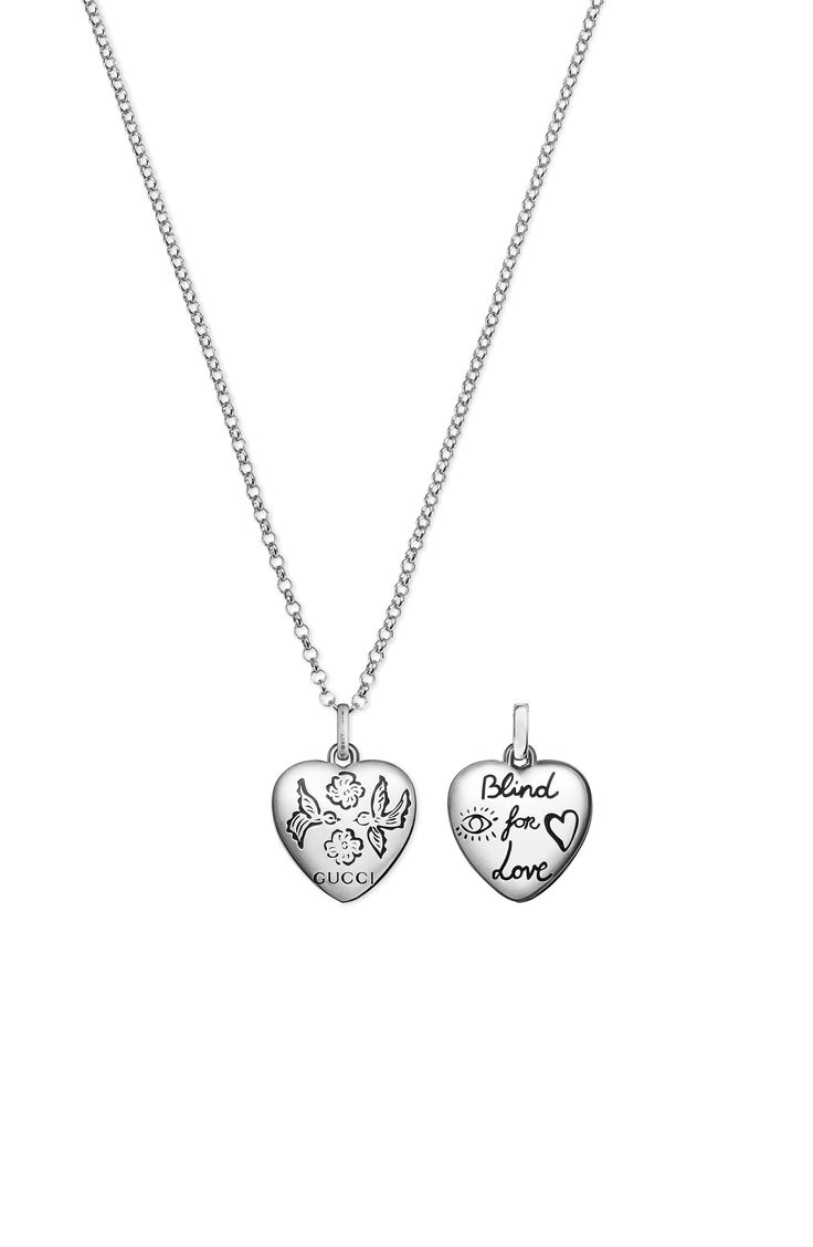 This elegant pendant necklace is anchored with a heart-shaped pendant engraved with the phrase "Blind for Love" and decorated with playful motifs of birds and flowers. Style Name:Gucci Blind For Love Pendant Necklace. Style Number: 5536891. Available in stores. Engraved Silver Gucci Necklace, Gucci Silver Sterling Silver Necklace, Gucci Sterling Silver Necklace, Gucci Engraved Jewelry For Anniversary, Gucci Silver Necklace As Gift, Silver Gucci Necklace As Gift, Gucci Silver Necklace For Gift, Silver Gucci Necklace For Gift, Gucci Sterling Silver Jewelry With Heart Charm