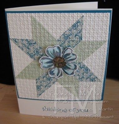 a close up of a greeting card with a flower on the front and back of it