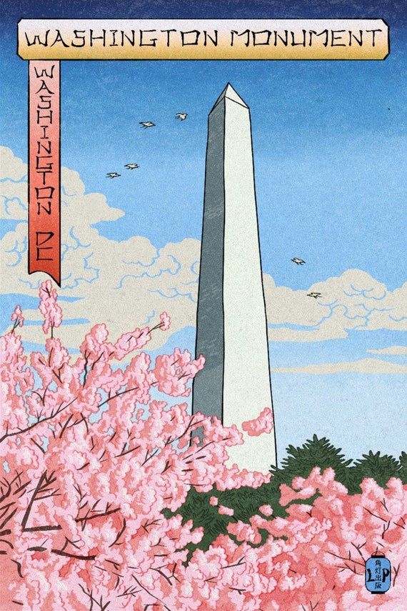 the washington monument is surrounded by cherry blossoms