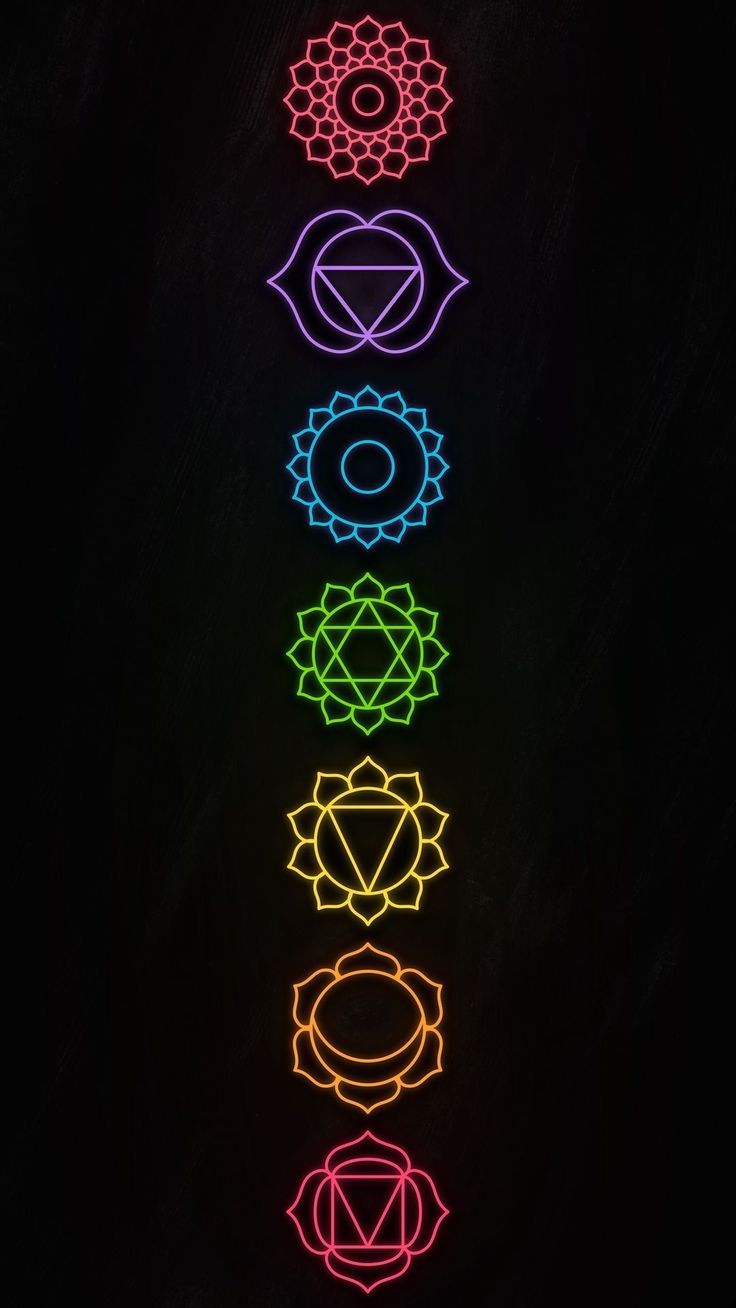 the seven chakras are lit up in different colors and shapes, all arranged in a row