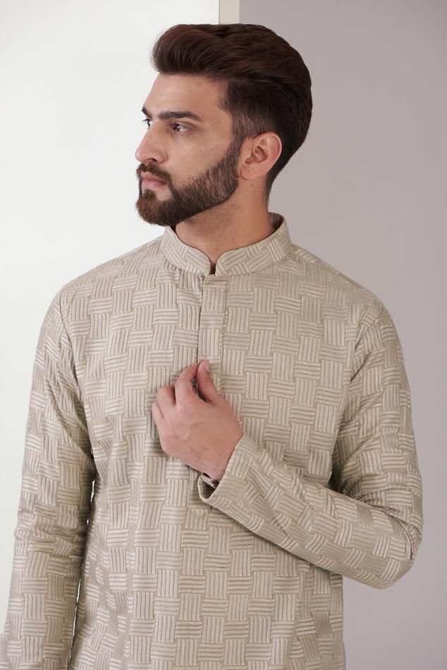 Beige kurta featuring full sleeves and a mandarin collar with chikankari embroidery in a geometric pattern, Fit: Relaxed Raw Silk Embroidery, Beige Kurta, Chikankari Embroidery, Embroidery Wedding, Kurta For Men, Beige Silk, Comfortable Pajamas, Kurta Pajama, Kurta With Pants