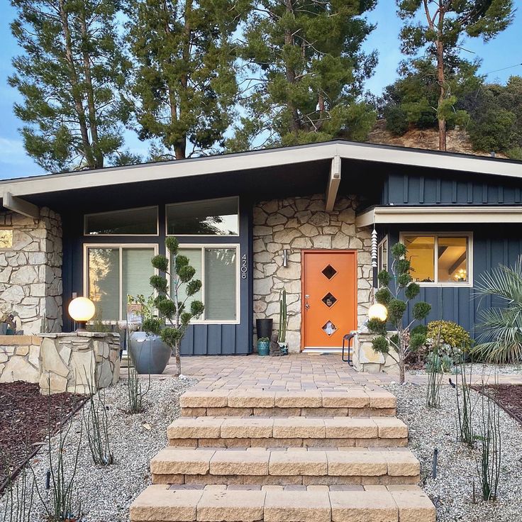 a house with steps leading up to the front door