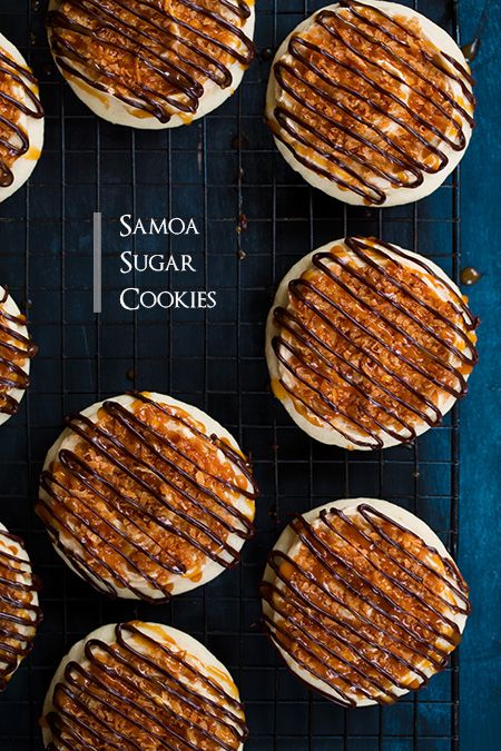 some cookies are on a cooling rack with chocolate drizzled over them and the words samoa sugar cookies