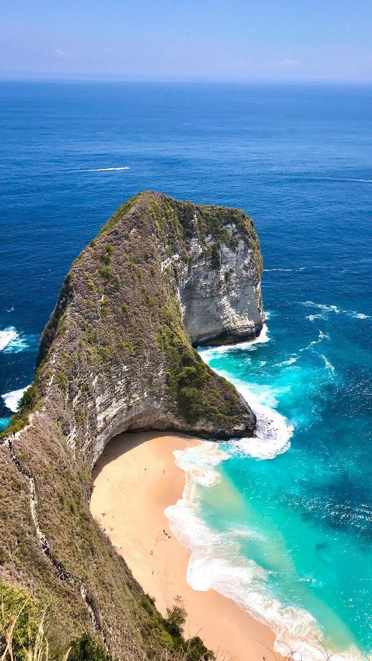 an aerial view of the beach and cliffs in nusa penida national park, bali