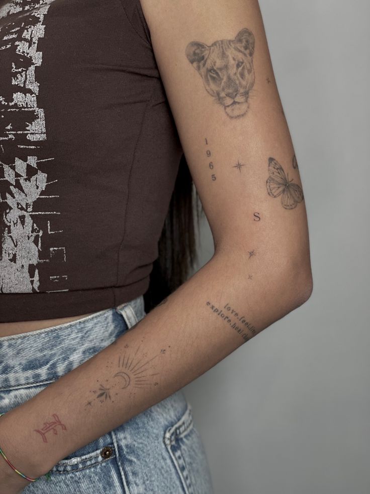 a woman with a tattoo on her arm