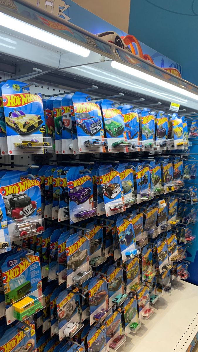 toy cars are on display in the store