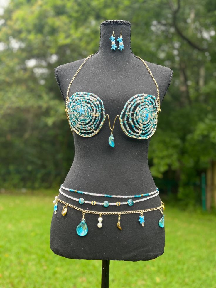 By the Sea is a hand beaded and hand crafted bra with corresponding waistbeads, belly chain, earrings, bracelet and ankle bracelet. Goose Creek, Belly Chain, Ankle Bracelet, Chain Earrings, Ankle Bracelets, By The Sea, Hand Beading, The Sea, Jewelry Bracelets