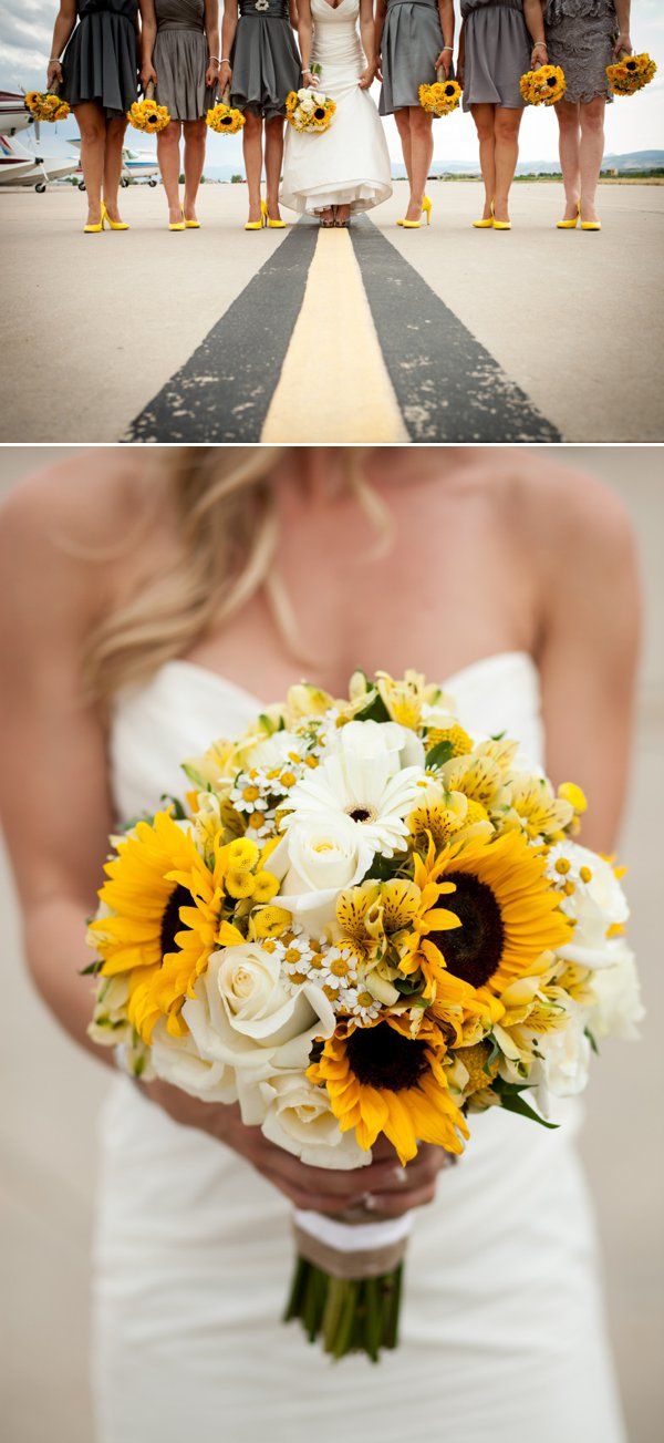 the bride and her bridal party are standing in front of an airplane with sunflowers