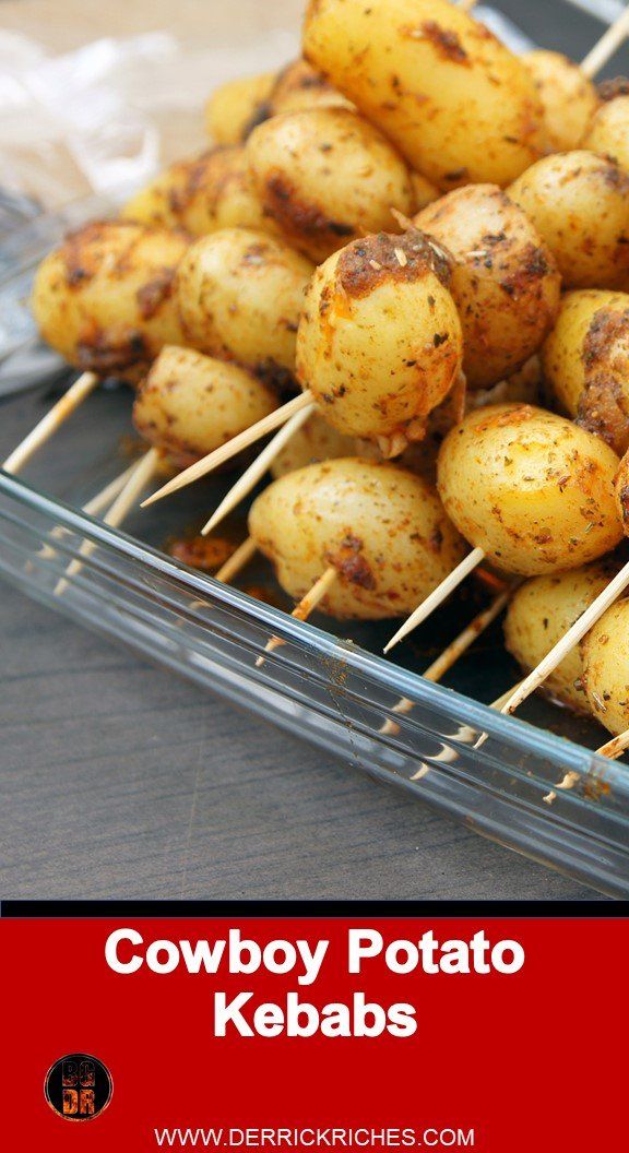 several skewered potatoes sitting on top of each other in a plastic container with the words cowboy potato kebabs