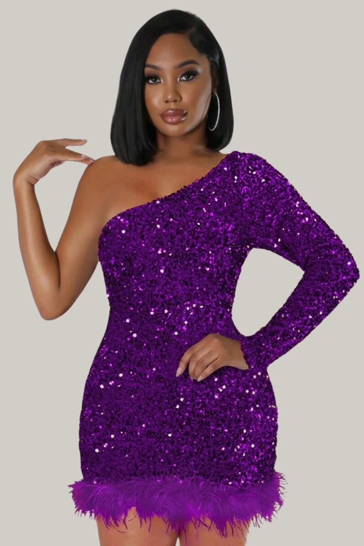 Transform any occasion into a luxurious affair with this party-ready, Feather One Shoulder Sequin Dress. The stunning design boasts a classic bodycon fit with exquisite embellishments such as contrast faux fur and shimmering sequins. The asymmetrical neckline adds a unique touch while the long sleeves and slim fit perfectly accentuate your natural waistline. The mini pencil hemline and high stretch fabric ensure a comfortable and elegant look. 95% Polyester, 5% Elastane Model is wearing size sma Elegant Formal Winter Sequin Dress, Elegant Winter Evening Sequin Dress, Glamorous One Shoulder Mini Dress, Glamorous Sheath Dress For Prom Season, Glamorous Sheath Evening Dresses, Glamorous Evening Sheath Dresses, Elegant Contrast Sequin Mini Dress For Prom, Elegant Mini Sequin Dress For Holiday Party, Elegant Embellished Sequin Dress For Winter