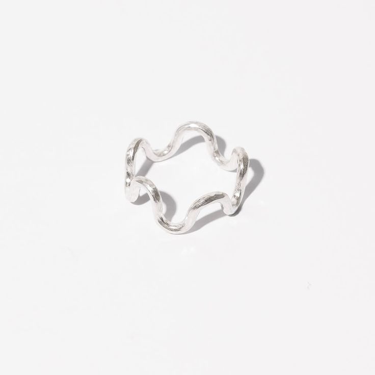 Sterling silver wave ring by Mulxiply Luxury Wavy Silver Jewelry, Adjustable Wavy Stackable Jewelry, Adjustable Stackable Wavy Jewelry, Adjustable Wavy Rings With A Modern Twist, Modern Silver Wavy Rings, Adjustable Silver Wavy Rings, Minimalist Sterling Silver Wavy Ring, Everyday Silver Jewelry With Wavy Design, Everyday Silver Jewelry With Wavy Shape