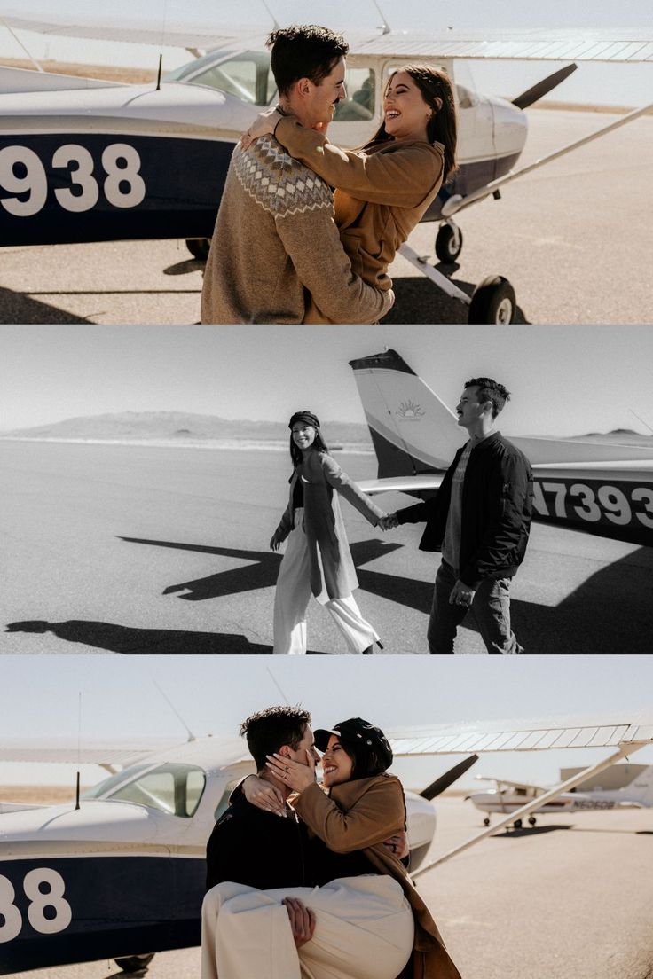 two people standing next to each other in front of an airplane and another person hugging