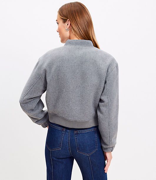 Infused with a rich touch of wool, get in the game with this perennially sporty-chic - not to mention versatile and comfy, to boot - bomber jacket. Ribbed knit tab collar, cuffs, and hem. Snap front. Dropped shoulders. Long sleeves. Front welt pockets.,Bullet1:20" long,Imported:Imported,Fit:Fit: Relaxed — an easy shape that's just shy of loose,Length:Length: Regular - hits below natural waist,Fabrication:Shell: 85% Polyester 12% Wool 3% Other Fibers, Lining: 100% Polyester,Garment Care:Machine W Trendy Varsity Jacket With Ribbed Cuffs For Fall, Trendy Fall Varsity Jacket With Ribbed Cuffs, Casual Cropped Jacket With Stand Collar, Relaxed Fit Cropped Jacket For Fall, Fall Track Jacket With Ribbed Cuffs For Workwear, Casual Cropped Jacket With Ribbed Cuffs For Fall, Casual Winter Track Jacket For Work, Sporty Long Sleeve Cropped Jacket For Fall, Sporty Fall Outerwear With Zipper Closure