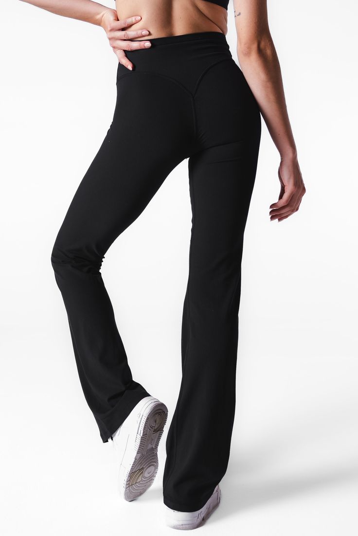 Our Cloud II Foldover Trouser is designed for the ultimate comfort whether you are enjoying your workout of the day or stopping by your favorite coffee shop. This pant offers medium support and compression to accentuate your assets. Black Breathable 4-way Stretch Pants, Hip-length Elastane Activewear With 4-way Stretch, Compressive Elastane Activewear, Compressive Hip-length Elastane Activewear, Versatile Full-length Activewear With Comfort Stretch, Black Athleisure Bottoms With 4-way Stretch, Fitted Leggings With Comfort Waistband For Training, Functional Stretch Hip-length Activewear, Sporty Compressive Yoga Pants With Light Support