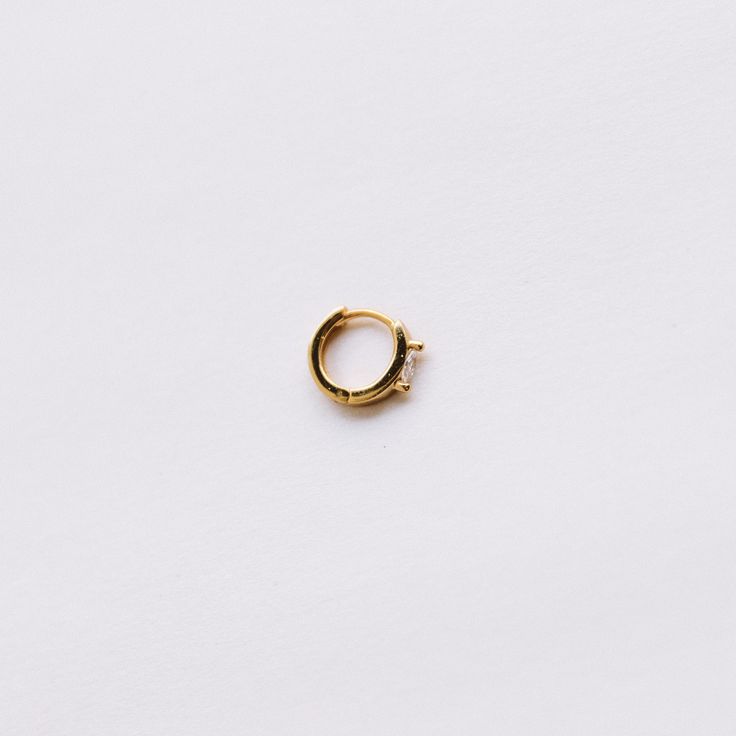 ~Sold as 1 earring ~Made with thick 18k gold plated on sterling silver~Set with brilliant white AAA grade diamond simulant~Inner Hoop diameter: 8mm~Outer Hoop diameter: 10 mm~Nickel Free & Lightweight, perfect for everyday wear Diamond Simulant, Hypoallergenic Earrings, Huggies Earrings, 18k Gold, Everyday Wear, Gold Plate, Plating, Stud Earrings, Sterling Silver