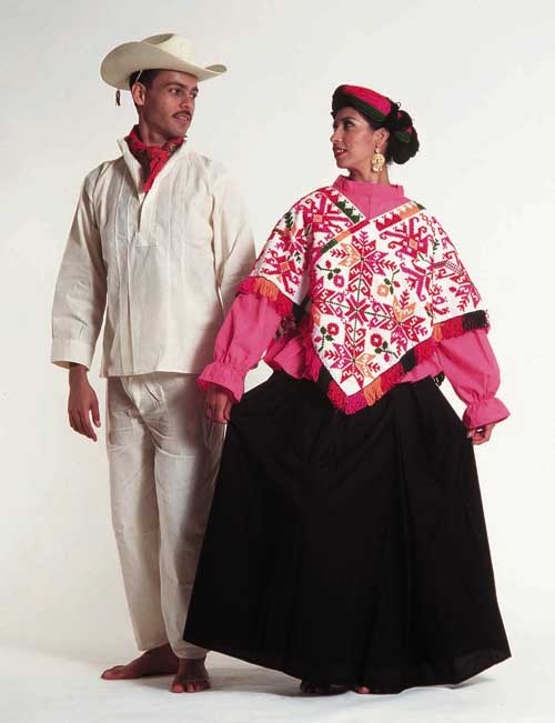 a man and woman dressed in traditional mexican clothing standing next to each other on a white background