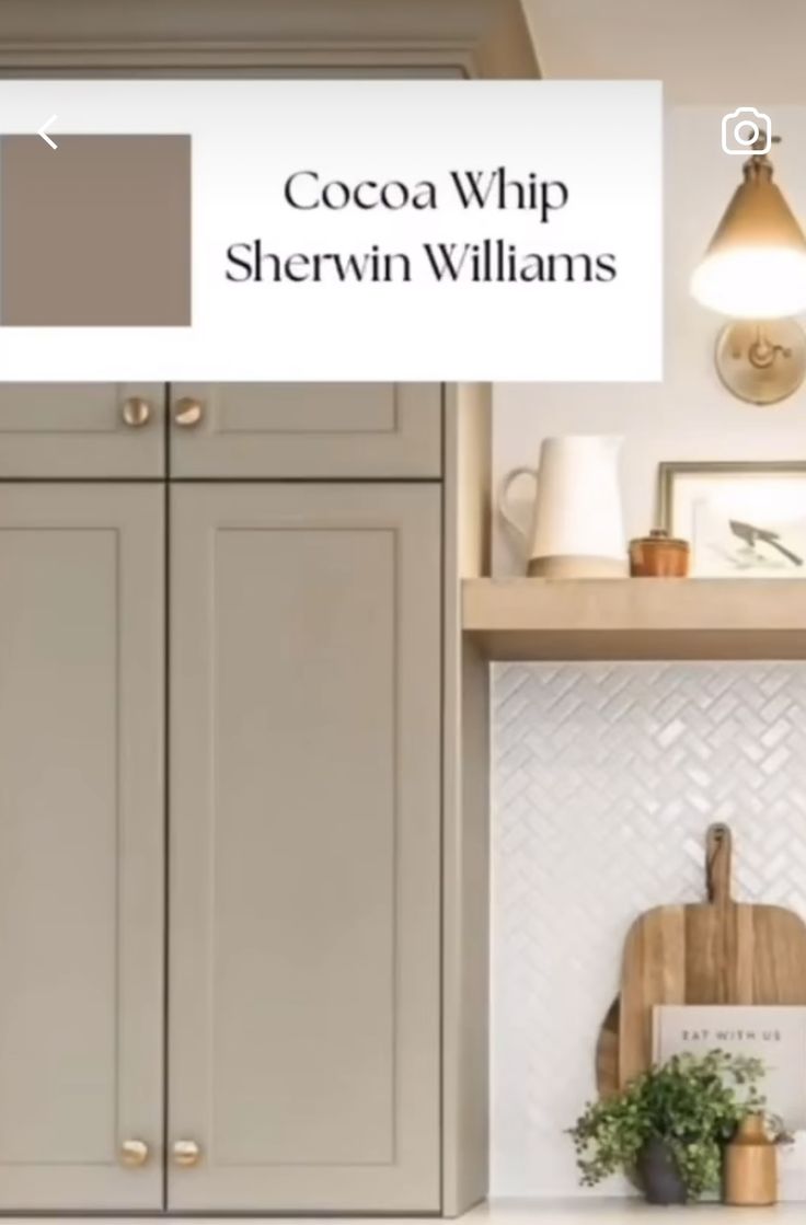 an image of a kitchen with gray cabinets and white counter tops in the color cocoa whip sherylin williams