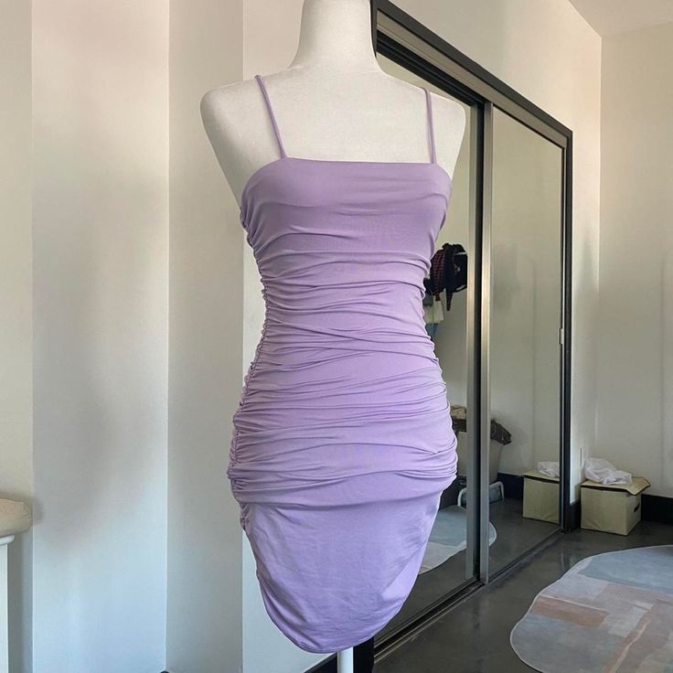 A Tight Bodycon Dress To Bring Out Your Body Shape. It’s Stretchy Too. Ships In 3 Days Text Me If You Have Any Questions #Ruched #Bodycon #Purple #Pastel #Cute Purple Stretch Spaghetti Strap Dresses, Purple Stretch Dress With Spaghetti Straps, Stretch Purple Dresses With Spaghetti Straps, Purple Ruched Bodycon Summer Dress, Purple Bodycon Dress With Spaghetti Straps, Purple Ruched Spaghetti Strap Dress, Purple Mini Length Bodycon Dress, Purple Fitted Bodycon Dress With Spaghetti Straps, Chic Purple Ruched Mini Dress