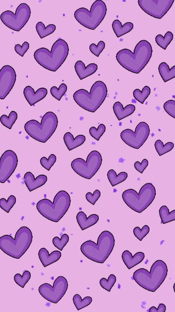 purple hearts on a pink background