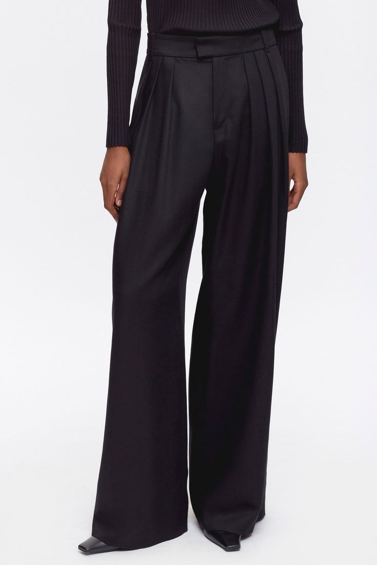 A breezy wide-leg trouser that exudes effortless elegance. Crafted from our drapey 100% lyocell twill, an ultra‑breathable renewable fibre derived from wood pulp. Designed with a flattering high waist and multiple pleats for added volume, and newly added belt loops for an adjustable fit and accessorizing. The Plaza Trouser is a statement pant that’s easily dressed up or down.